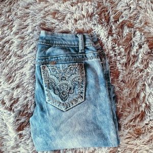 stretchy acid wash jeans with pocket detail